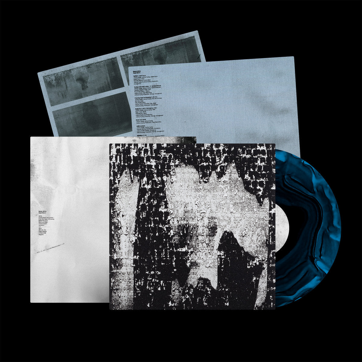 Space Afrika - Quiet Storm Blue Ripple vinyl and insert.