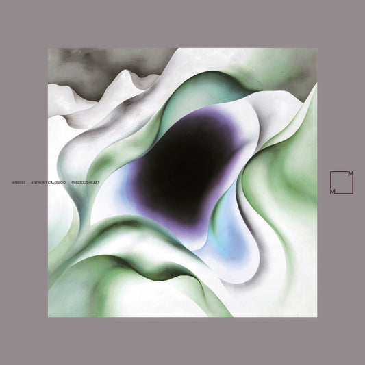 Abstract art with wavy patterns and a dark center on a gray background