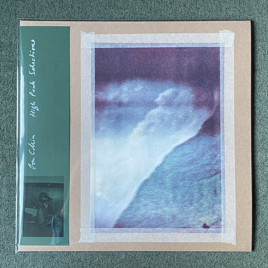 LP cover with a scenic print and text on a textured surface