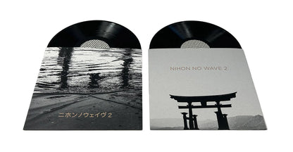 Vinyl record covers with black and white design elements on a white background
